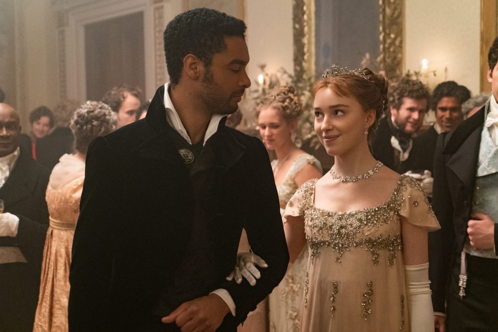 Regé-Jean Page and Phoebe Dynevor in Bridgerton. The drama's casting encourages viewers to think about colour and race more carefully, says Dr Hannah Greig. (Image by LIAM DANIEL/NETFLIX © 2020) Regé-Jean Page and Phoebe Dynevor meet for a dance in Bridgerton