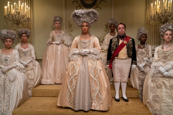 “At Queen Charlotte’s court, protocol was everything,” explains Catherine Curzon. In Bridgerton, Queen Charlotte is played by Golda Rosheuvel (centre). (Image by Liam Daniel/Netflix © 2022) Queen Charlotte (played by Golda Rosheuvel) and her court in Bridgerton
