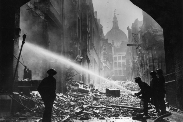 Firemen tackle a blitz fire amidst the rubble surrounding St Paul's Cathedral, London, during the Second World War Firemen tackling a blitz fire at St Paul's Cathedral, London