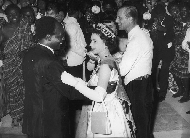 Living The High Life 20th November 1961: Queen Elizabeth II dances with Ghanaian president Kwame Nkrumah (1909 - 1972) at a farewell ball held at State House, Accra. They, and the Duke of Edinburgh, are dancing to a version of 'High Life' composed specially for the occasion and entitled 'Welcome Your Majesty'. (Photo by Central Press/Getty Images)