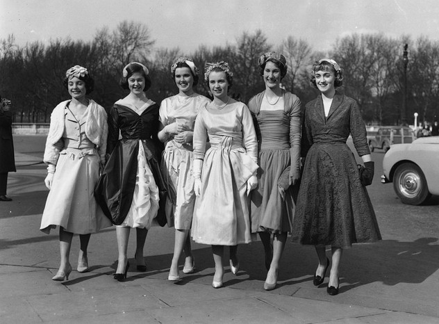 Debutantes 19th March 1958: A group of debutantes arriving at Buckingham Palace, London, for a presentation party. From left to right, they are Sally O'Rorke, Julia Chatterton, Victoria Bahurst-Norman, Jane Danzell, Margaret Westrop and Caroline Edwards. (Photo by Edward Miller/Keystone/Getty Images)
