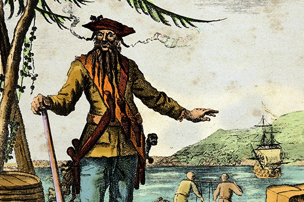 Blackbeard, real name Edward Teach, seen standing on a dock with fuses in his beard (Photo by Getty) Blackbeard, real name Edward Teach, seen standing on a dock with fuses in his beard