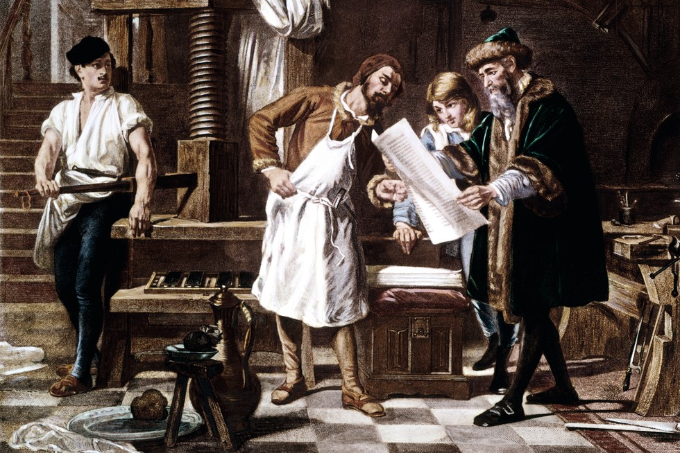 Johannes Gutenberg examines a page from the moveable type printing press that he invented (Photo by Sipley/ClassicStock/Getty Images) Johannes Gutenberg examines a page from the moveable type printing press that he invented