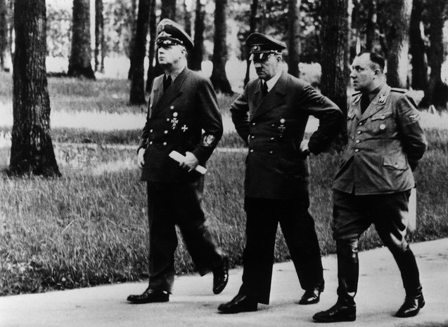 Martin Bormann, pictured right, with Adolf Hitler and Joachim von Ribbentrop, foreign minister under the Nazi regime, in August 1943. (Photo by ullstein bild via Getty Images) Martin Bormann