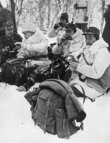 Members of the Finnish Army's 'International Brigade', stationed on the Northern Finnish Front during the conflict with the Soviet Union, have a warm drink to ward off the cold. Photo dated 2 January 1940. (Photo by Keystone/Getty Images) Members of the Finnish Army's 'International Brigade' during the war with the Soviet Union, January 1940