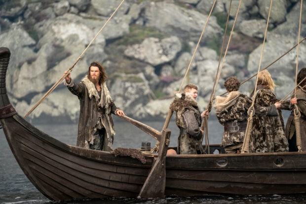 Leif Erikson (Sam Corlett) sails into Kattegat unaware of the chaos that awaits him (Photo by Bernard Walsh/Netflix) Leif Erikson sails into Kattegat on boat in Vikings Valhalla