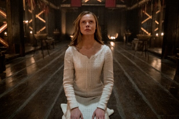 Freydis Eiriksdottir (Frida Gustavsson) goes on a spiritual journey in Vikings Valhalla (Photo by Bernard Walsh/Netflix) Freydis Eiriksdottir (Frida Gustavsson) kneels on the wooden floor of Viking hall in Vikings Valhalla