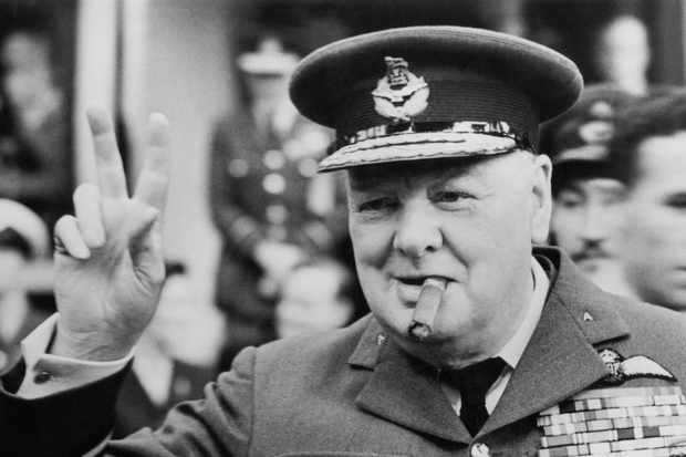 Winston Churchill gives his famous v-sign as he opens the new headquarters of 615 (County of Surrey) Squadron of the RAAF (Royal Auxiliary Air Force) at Croydon, 1948. (Photo by Central Press/Hulton Archive/Getty Images) Winston Churchill gives his famous v-sign as he opens the new headquarters of 615 (County of Surrey) Squadron of the RAAF (Royal Auxiliary Air Force) at Croydon, 1948. (Photo by Central Press/Hulton Archive/Getty Images)